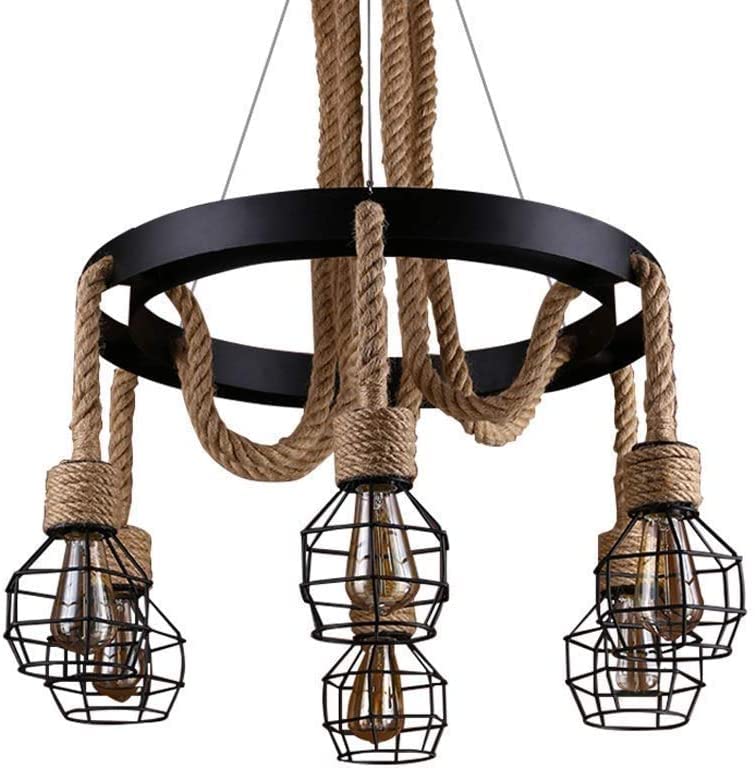 Suspension cage industrielle pour éclairer une table de restaurant moderne avec élégance