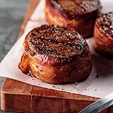 Omaha Steaks Ultimate Gift Collection (Bacon-Wrapped Butcher's Cut Ribeye Filets, Beef Sirloin Tips, PureGround Filet Mignon Burgers, Kielbasa Sausages, Stuffed Baked Potatoes, and more)