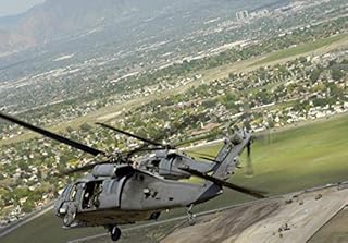 HH-60 Pave Hawks in flight over Utah Poster Print by Stocktrek Images (17 x 11)