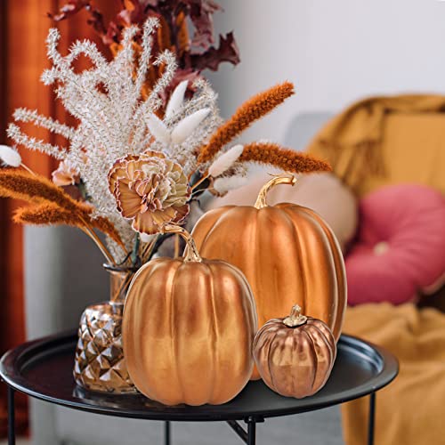 Image of Winlyn 7 Pcs Assorted Sizes Artificial Metallic Bronze Pumpkins Rustic Decorative Fall Foam Pumpkins for Gifts Thanksgiving Halloween Harvest Fall Wedding Table Centerpiece Mantel Shelf Decor