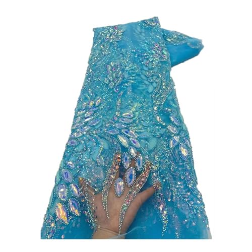 Broderie perles en tube haut de gamme sur tissu paillettes lourd