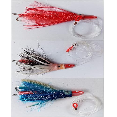 KIT 3 ESCHE ARTIFICIALI PER PESCA A TRAINA TONNI, TONNETTI, LAMPUGHE E PALAMITI. IL KIT E' COMPOSTO DA TRE OCTOPUS ARMATI DA UN DOPPIO AMO MISURA 1/0 LEGATI SU UNA LENZA DELLO 0,90 DI CIRCA METRI 1,50.