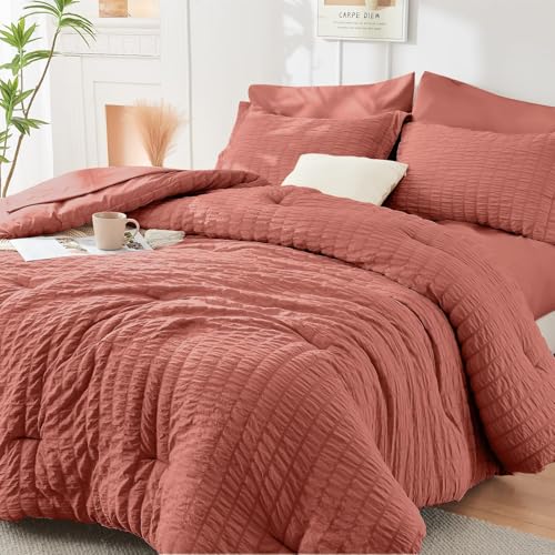 Image of HYMOKEGE Coral King Size Comforter Set Seersucker 7 Pieces, All Season Luxury Bed in a Bag for Bedroom, Bedding Set with Comforter, Sheets, Pillowcases & Shams