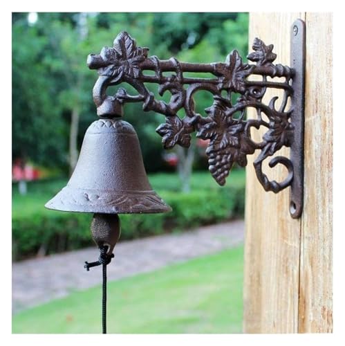 Campana de Hierro Fundido, Campana de Pared, Campana de Cena de Hierro Fundido Campana de Pared de Hierro Fundido Resistente presentada en una casa de Campo rústica Antigua de época