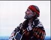 Posterazzi Willie Nelson In Multi Colored Jacket Playing Guitar Photo Print 16 x 20 - Item # MVM54239