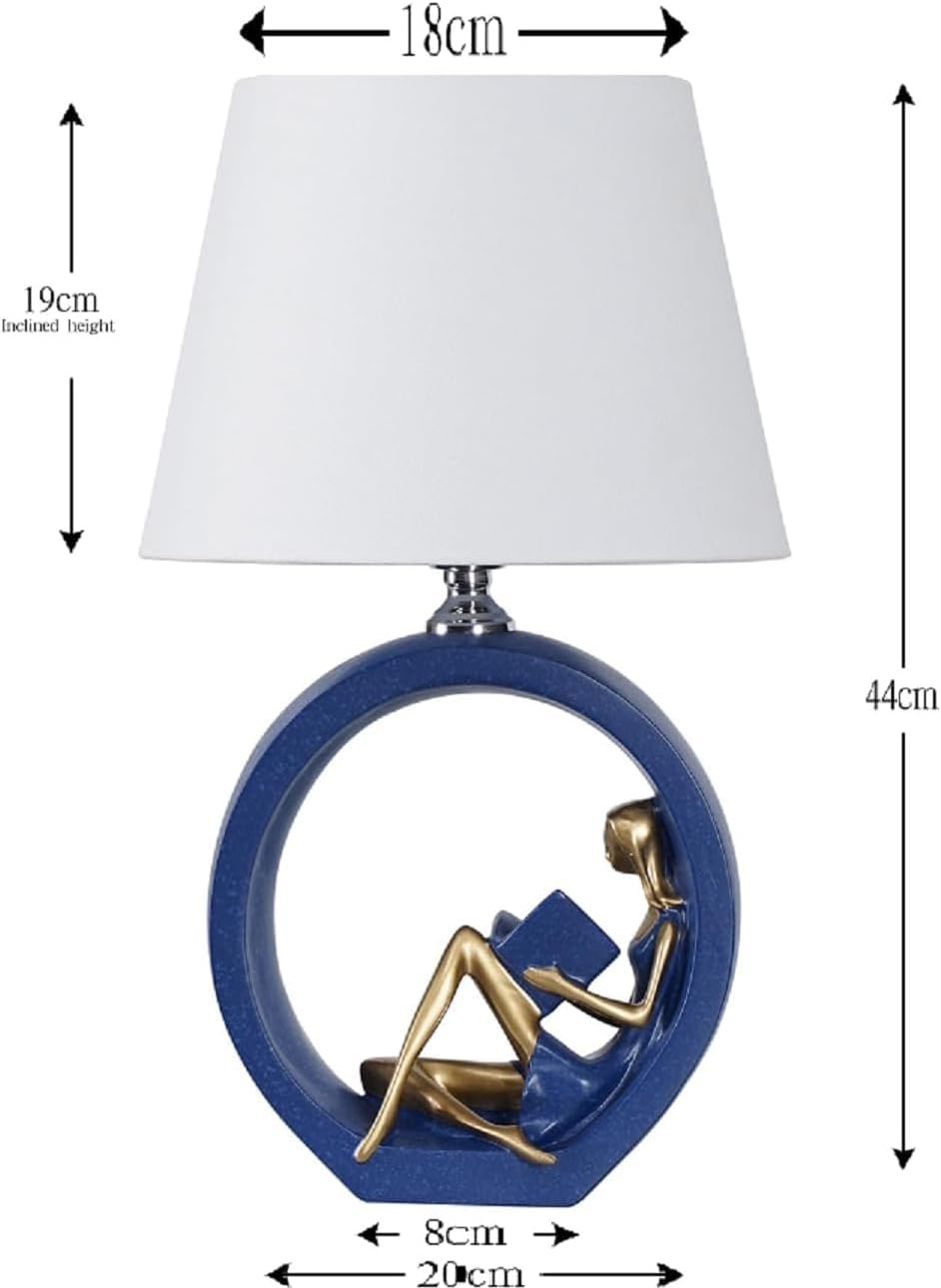 Decorative Table Lamp with Reading Figure Base, Blue and Gold, Circular Resin Base, White Shade, 17.3 Inch Height