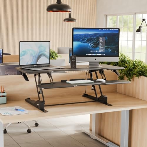 Image of Mount-It! 47 inch Standing Desk Converter, XL Desktop Sit-Stand Desk Riser with Gas Spring Height Adjustment, Wide Desk Topper for Dual Monitors or Monitor & Laptop, Keyboard Tray, Black