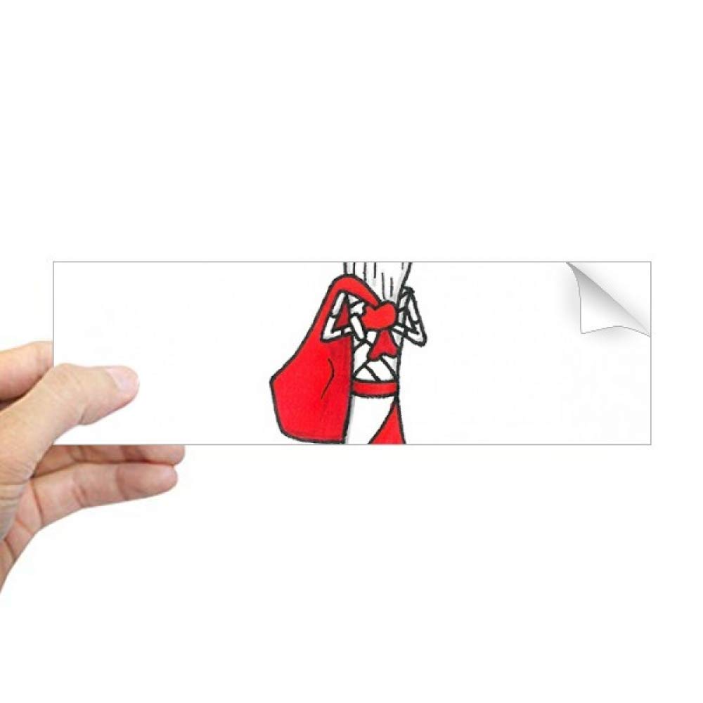 Fenêtre de Noël décorée grâce à cet autocollant rectangulaire pour carnet