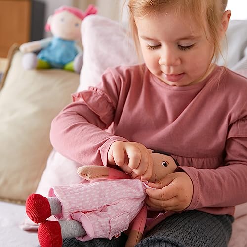 Image of HABA Snug Up Doll Rumbi - 10 inch Soft Doll with Black Hair and Pink Overalls - Machine Washable for 18 Months and Up