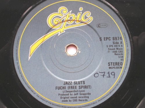 Jazz Sluts Fuchi 7" Epic SEPC8974 EX 1980 there is handwritten number on label and 2mm drill hole in label rim