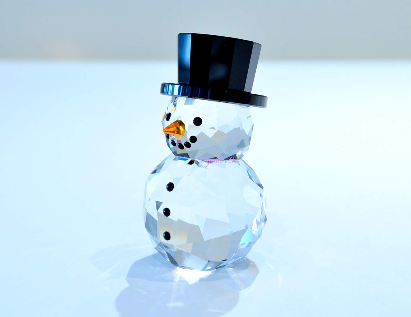 Amazon.com: SWAROVSKI Snowman with Hat - 5135852 : Home & Kitchen