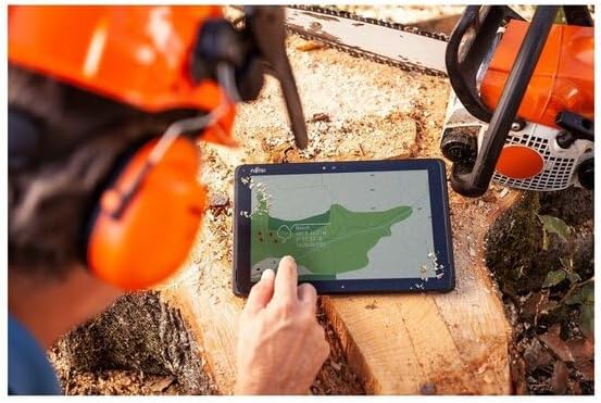 Fujitsu Stylistic Q5010 Tablet being used in an industrial environment, demonstrating its durability.