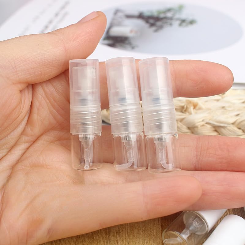 Atomizador de perfume 20/50/100 piezas 1 ml spray de perfume de vidrio portátil botella recargable dispensador de muestras de bombeo directo prensa de pulverización fina botellas vacías recargables