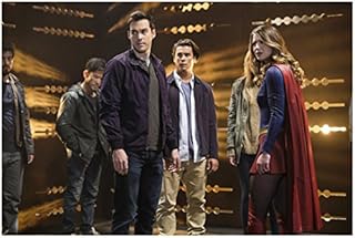 Supergirl Melissa Benoist as Supergirl and Chriss Wood as Mon-El standing in container with others 8 x 10 Inch Photo