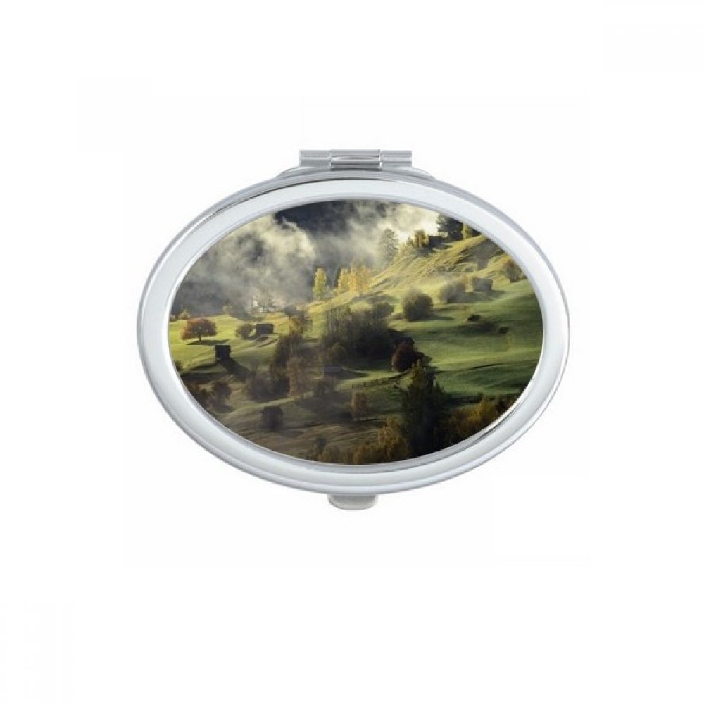 Miroir de poche ovale avec paysage de forêt pour retouches