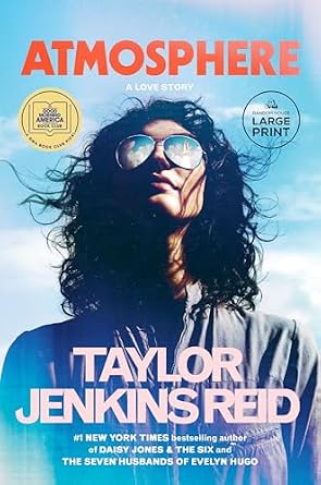 Atmosphere by Taylor Jenkins Reid, a psychological fiction book cover depicting a woman with curly brown hair and sunglasses looking up at a rocket taking off. The background depicts a blue, cloudy sky, and the title is written at the top of the cover in bold, orange letters.