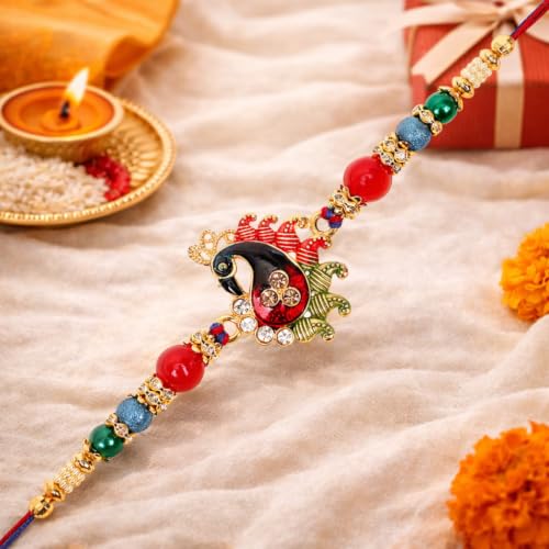 Image of Riddhika Ventures Glorious Gold Plated Meenakari Peacock Rakhi with Roli Chawal and Greeting Card