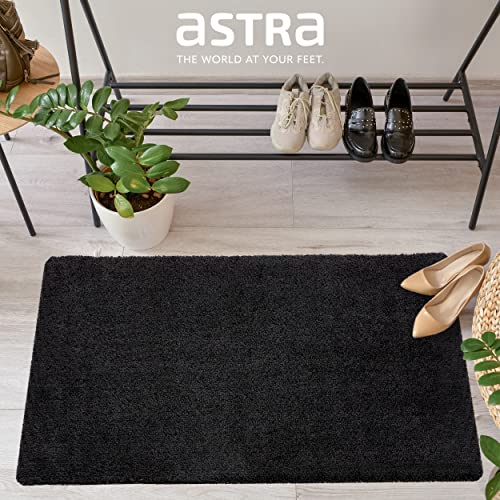 Tapis de propreté pour éliminer les traces de pas dans l'entrée