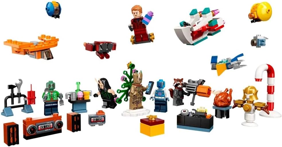 A close-up view of several LEGO minifigures and mini-builds from the Guardians of the Galaxy Advent Calendar, including Star-Lord, Rocket Raccoon, and Groot, highlighting their intricate details.