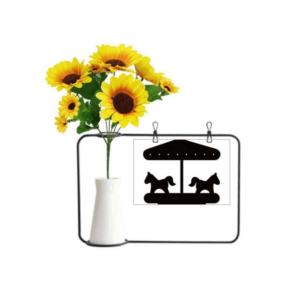 Carrousel d'attraction avec tournesols artificiels et carte cadeau chic