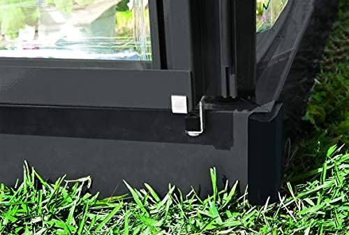 Close-up of the magnetic door catch on the greenhouse door