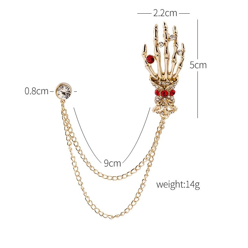 Image of Gothic Halloween Skull Hand Brooch Pin for Women Men Punk Vintage Crystal Skeleton Tassel Chain Lapel Pins Dark Skull Brooches Sweater Suit Accessory