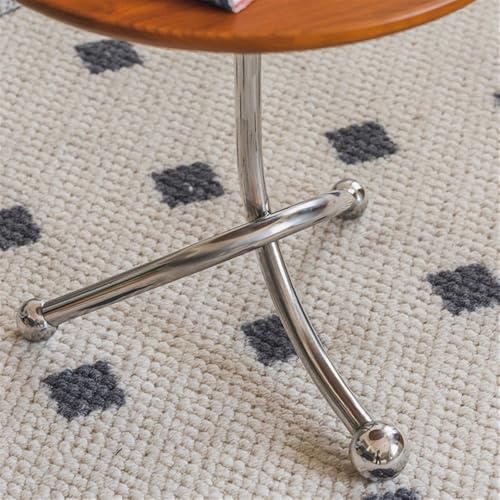 Table d'appoint de salon ronde en acier pour optimiser les petits espaces