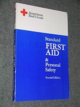 Paperback Standard First Aid and Personal Safety Book