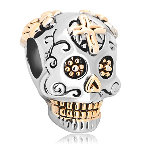 Dijes de calavera de Halloween artesanales en cobre con cruz floral