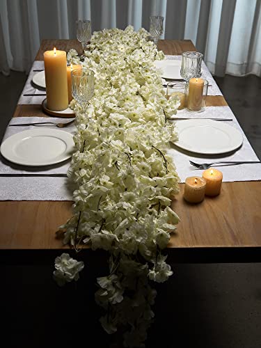 Guirlande fleurs de cerisier artificielles pour embellir un mur nu