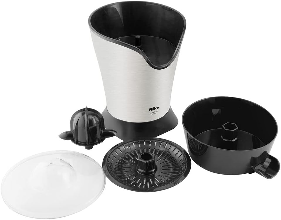 A hand pressing an orange half onto the Philco PEF750P citrus juicer cone to extract juice.