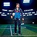 Barbie Signature Fashion Doll, Ted Lasso Wearing Blue Tracksuit with AFC Richmond Logo, Collectible in Displayable Packaging