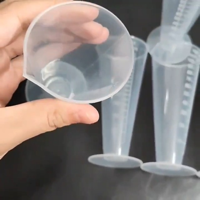 Vaso medidor cónico plástico 100 ml miniatura 7