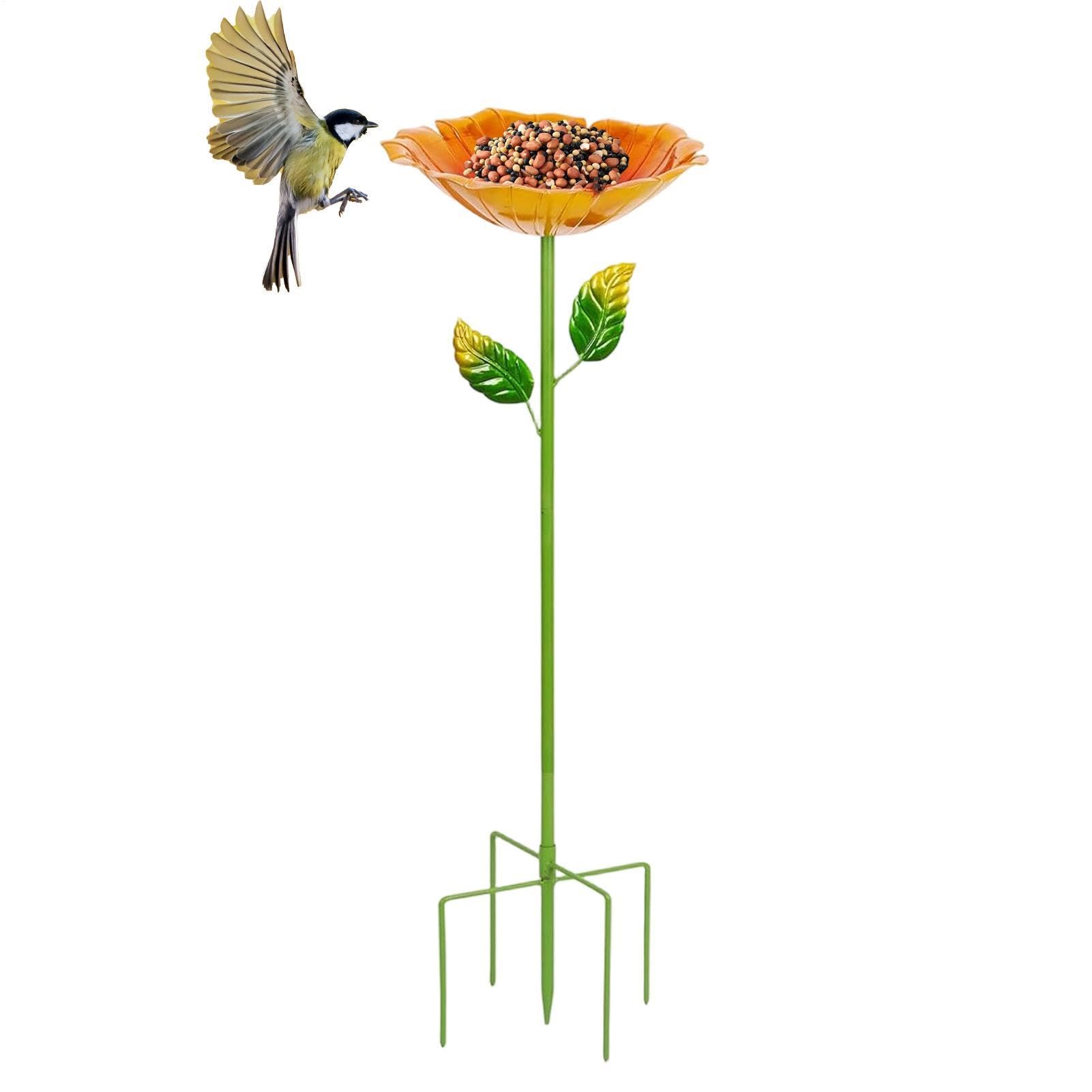 Baño para pájaros multicolor que alegra el jardín y atrae vida silvestre