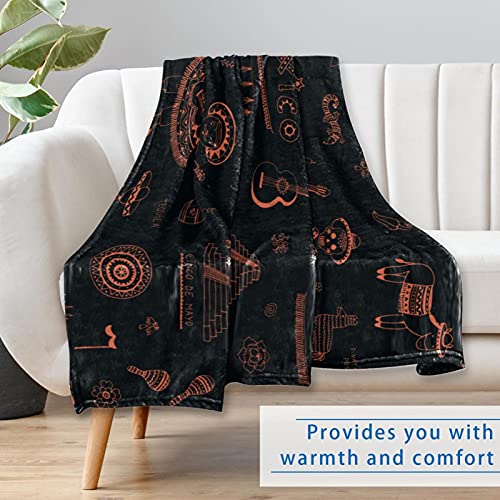 Couverture douce contre le froid : plaid mexicain idéal lit et canapé