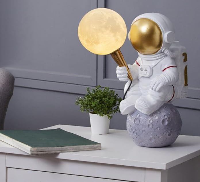 Image of Lunar Astronaut Resin Bedside Table Lamp for Kids' Room Desk Lamp- Warm White (Bulb Included)|Rest Pose