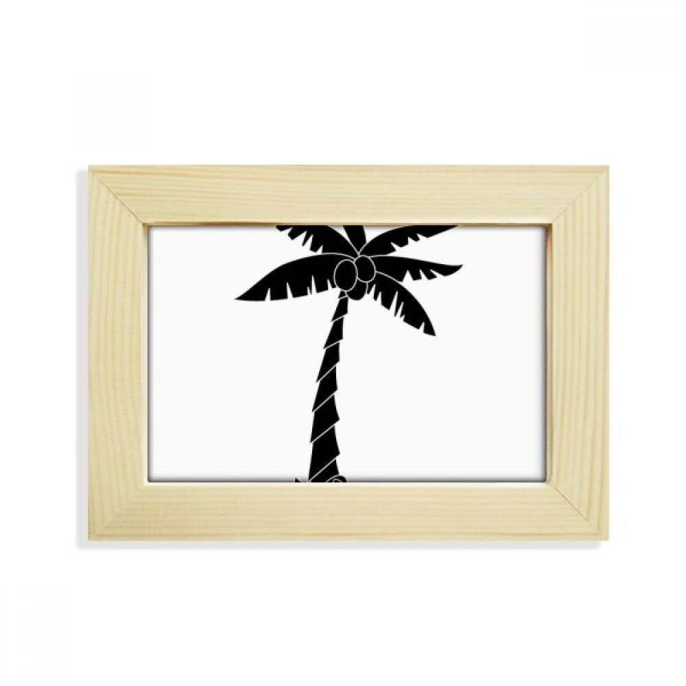 Silueta de árbol de coco negro en marco de fotos de madera para decorar tu oficina de diseño