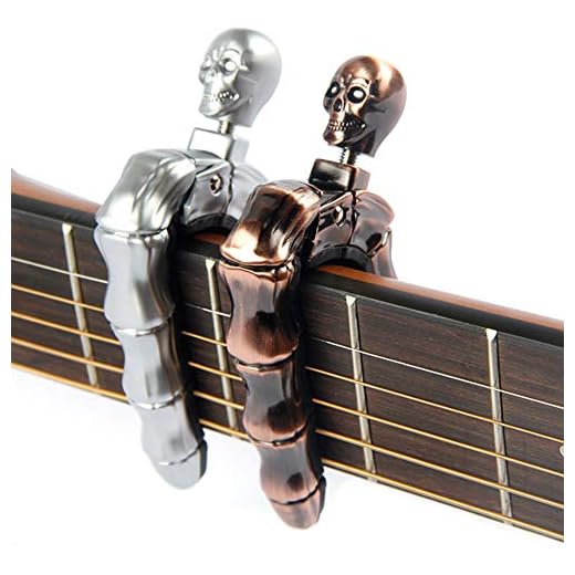 YUEKO Guitar Capo Skull Knob Design Universal 4 5 6 12 Strings Instrument Capos for Electric Classical Acoustic Guitar Bass Ukulele Mandolin Banjo and More(Bronze)