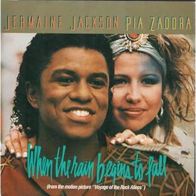 When the rain begins to fall (from the motion picture "Voyage of the Rock Aliens") / Follow My Heartbeat / JERMAINE JACKSON / PIA ZADORA / Bildhülle 1984 ARISTA # 106 883 / Deutsche Pressung / 7" Vinyl Single Schallplatte