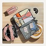 Amazon Basics 3-Piece Luggage Set, Including One Carry-On Luggage (22" Expandable Hardside Suitcase With 8 Spinner Wheels), One 15-inch Tote Bag, and One 10-inch Compact Travel Bag, Rose Gold - Image 4