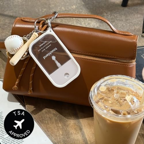 Image of Touchland Vacation Mode Set Beach Coco Hydrating Hand Sanitizer & Case | TSA ready Power Mist with skincare benefits & Icy White case. Tropical scent, transporting you to sun-drenched shores.