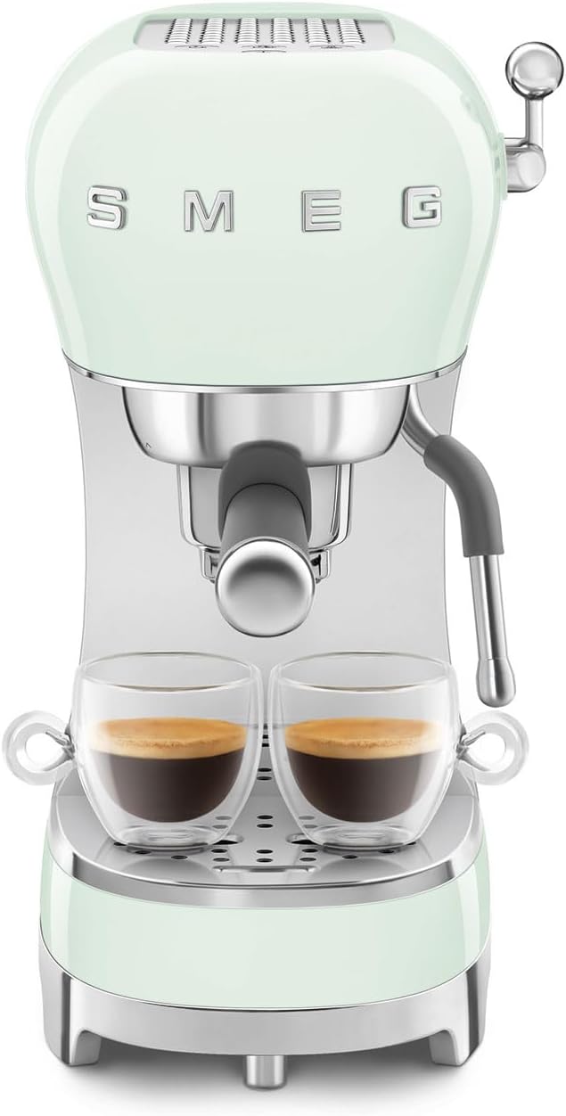 Smeg ECF02 Espresso Machine brewing two cups of espresso