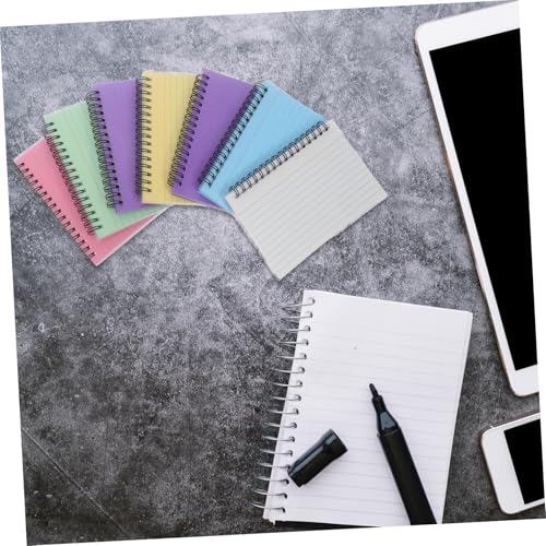 Pages détachables et reliure spirale sur ce lot de 7 blocs-notes compacts de bureau
