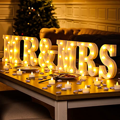 Panneaux LED Mr & Mrs et bougies sans flamme pour une table de mariage sécurisée