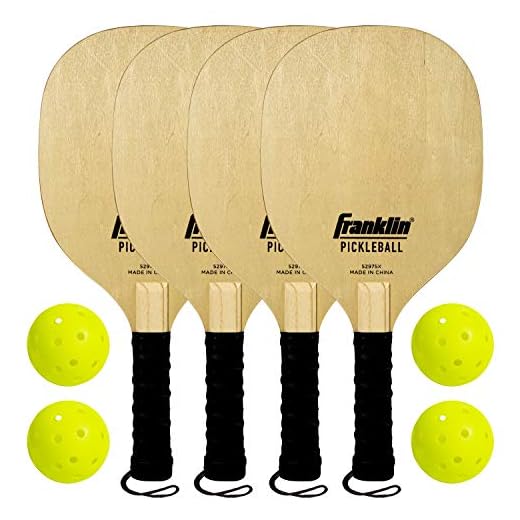 Franklin Sports Wooden Pickleball Paddle and X-40 Pickleball Set - Includes (4) Wooden Paddles and (4) pickleballs - USA Pickleball Approved X-40 Balls
