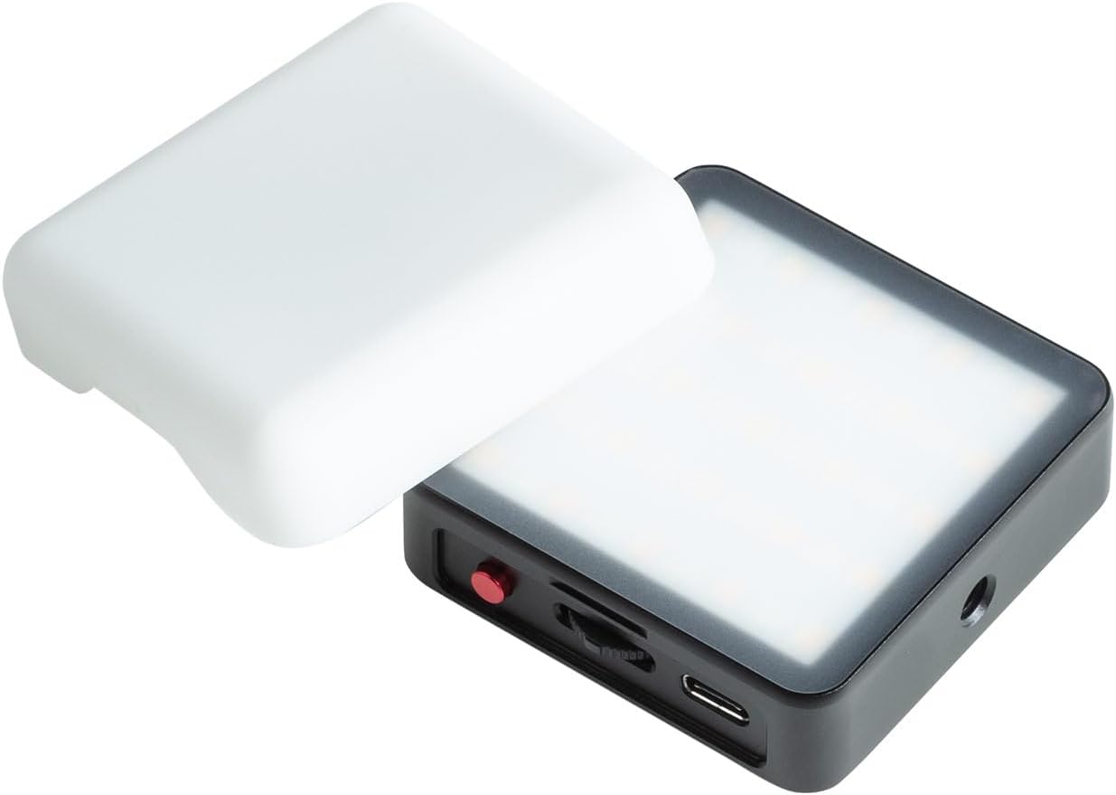 Instarter Mini LED Video Light with its white diffuser cover placed next to it, showing the light panel and controls.
