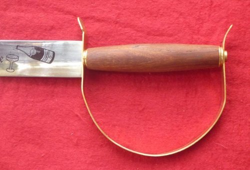 Uster champagne saber wood handle