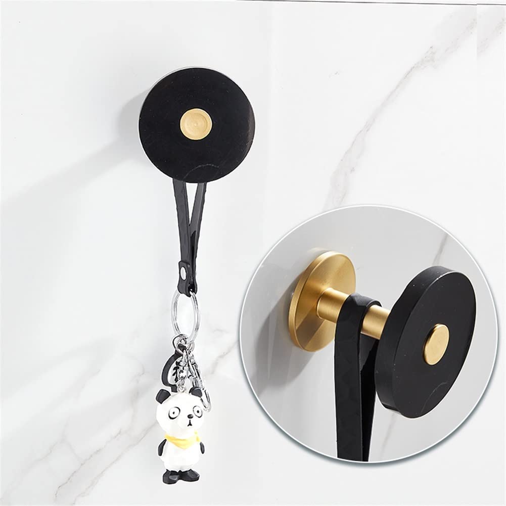 Porte-serviettes en laiton et marbre pour routine beauté moderne
