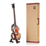 HANDCRAFTED WOODEN MINIATURE REPLICA of Rush Miniature Rick Bass Guitar by Axe Legends YOUR AXE LEGENDS SET ALSO INCLUDES a mini adjustable A-frame stand to display your miniature guitar, a personalised mini leather guitar strap, all shipped in a stu...