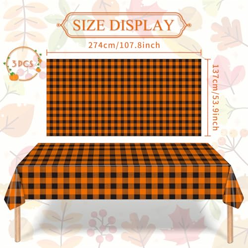 Image of Gistome 3-Piece 54 x 108 Inch Orange and Black Checkered Plastic Tablecloth - Disposable Rectangle Table Cover for Dining, Birthday, Halloween, Thanksgiving, Autumn Fall Themed Decorations